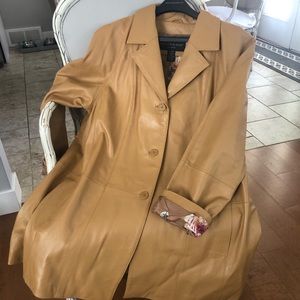 Centigrade leather coat. Luxurious soft caramel color with floral lining.